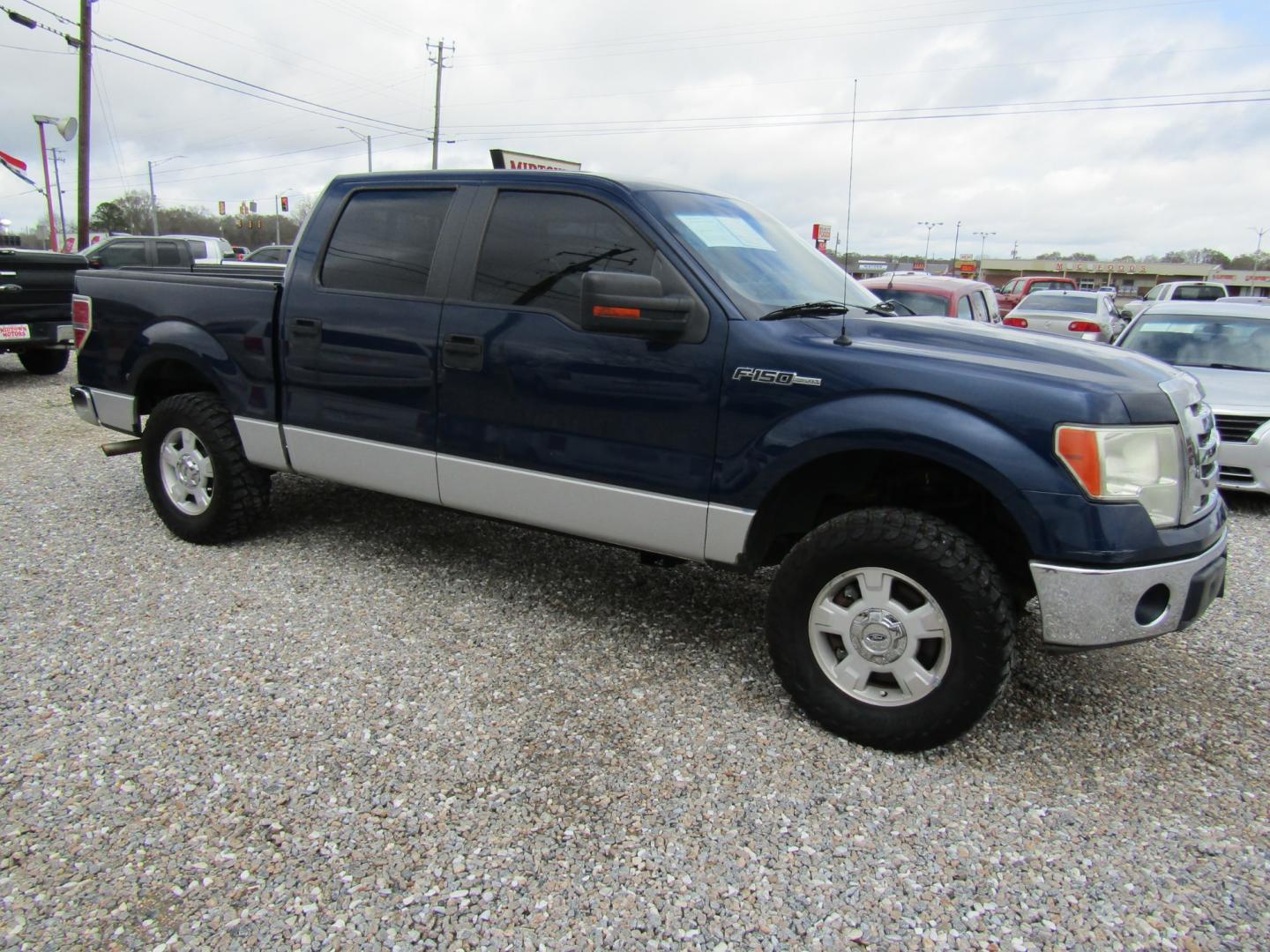 2010 Blue /Tan Ford F-150 Lariat SuperCrew 5.5-ft. Bed 2WD (1FTEW1C88AF) with an 4.6L V8 SOHC 24V engine, Automatic transmission, located at 15016 S Hwy 231, Midland City, AL, 36350, (334) 983-3001, 31.306210, -85.495277 - Photo#0